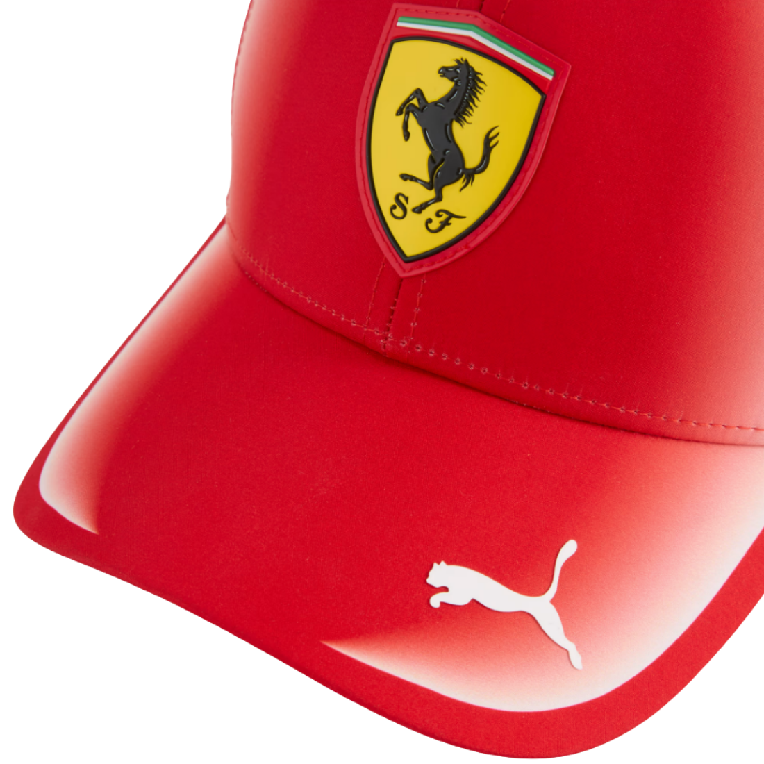 Red PUMA Ferrari cap featuring a Ferrari shield logo and white PUMA cat logo on the brim