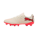 A Puma soccer cleat in off-white with a red Puma cat logo and a bright red sole, shown from the side on a white background.