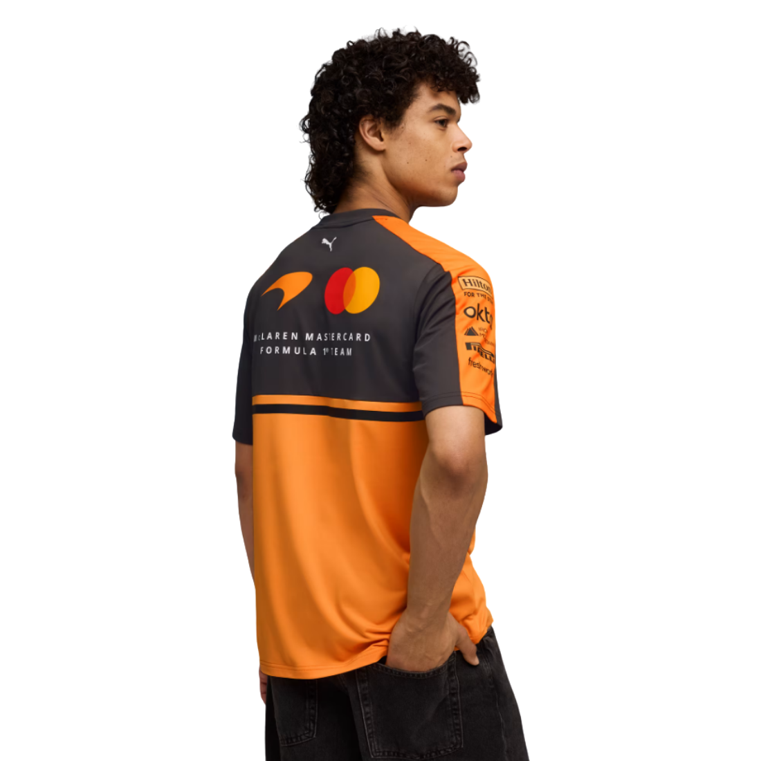 Back view of PUMA McLaren Formula 1 team replica jersey in orange and grey with sponsor logos