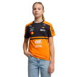 Youth wearing PUMA McLaren replica jersey in orange and black with sponsor logos