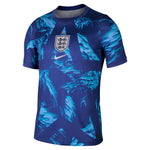 Blue soccer jersey with a pattern and Nike logo on a white background