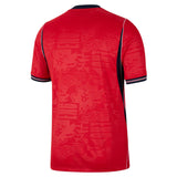 Red sports jersey with black accents on a white background