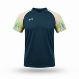 A short-sleeve athletic jersey in dark teal with a multicolor pastel abstract pattern on the sleeves, featuring a white logo on the left chest and a small red tag near the bottom hem.