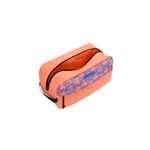 A peach-colored zippered pouch with a blue and purple geometric pattern on the front, shown open on a plain white background.