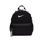 A black Nike backpack with a white swoosh logo on the front, featuring a top handle, a zippered main compartment, a front zippered pocket, and a black-and-white patterned upper section. A 'JUST TOO LATE' keychain tag hangs from the side zipper.