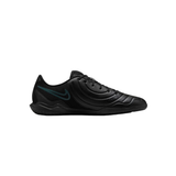A black Nike soccer shoe with a subtle dark teal-green swoosh accent on the side, shown in profile against a plain white background.
