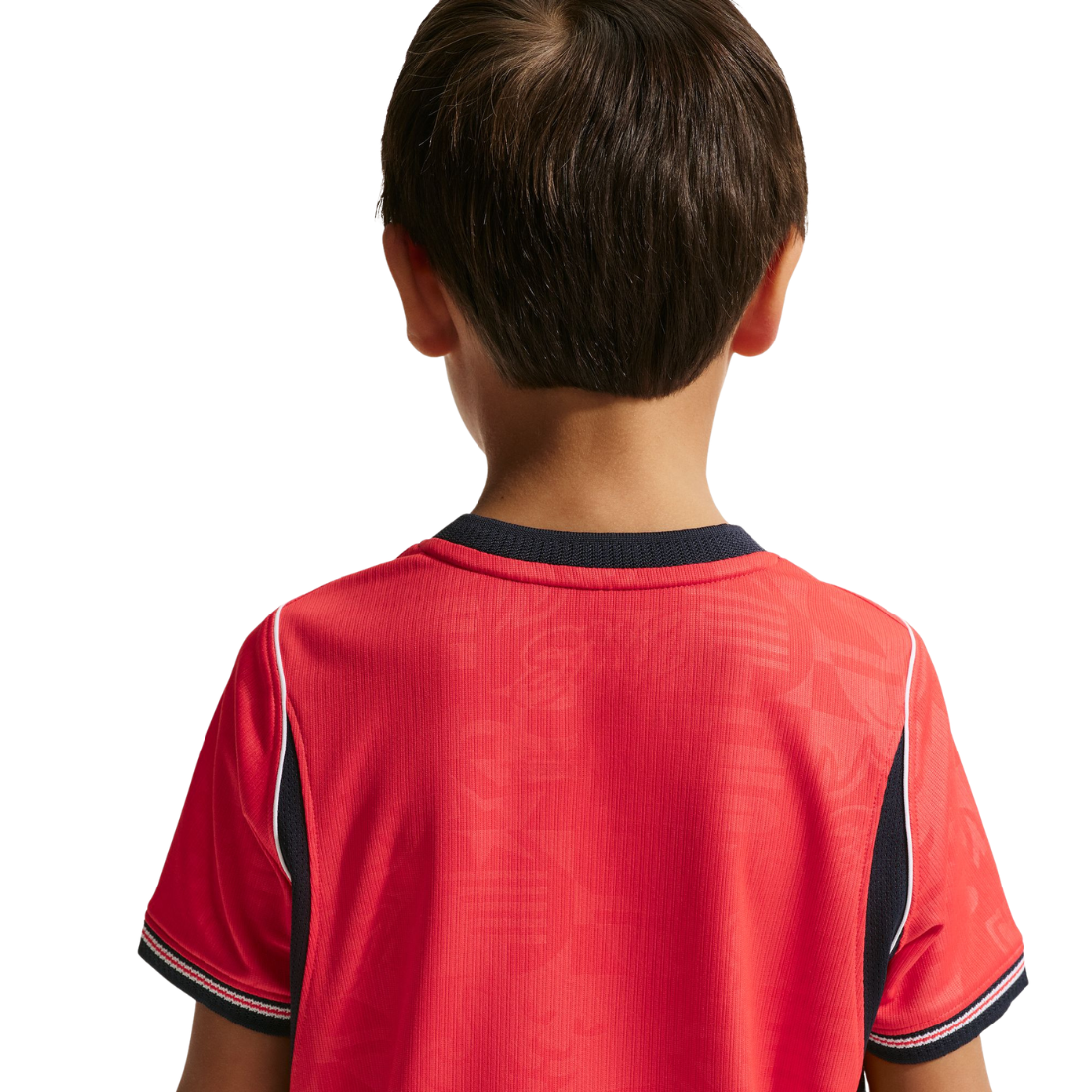 Child wearing a red sports jersey with black accents on a white background