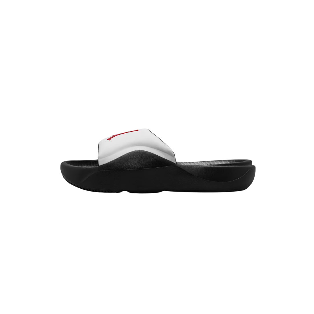 A single slide sandal shown in side profile against a plain white background. The sandal features a black sole and footbed with a metallic silver strap that has a small red accent logo near the top.