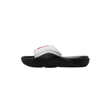 A single slide sandal shown in side profile against a plain white background. The sandal features a black sole and footbed with a metallic silver strap that has a small red accent logo near the top.