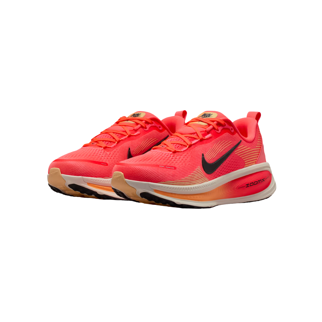 A pair of Nike running shoes in a vibrant neon orange and coral pink colorway, featuring a black Swoosh logo and a beige midsole, shown against a plain white background.