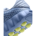 Close up of blue Nike Mind 002 training shoe heel with yellow traction pods