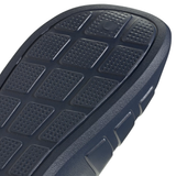 Navy blue textured outsole of Adidas Adilette Flow unisex slippers