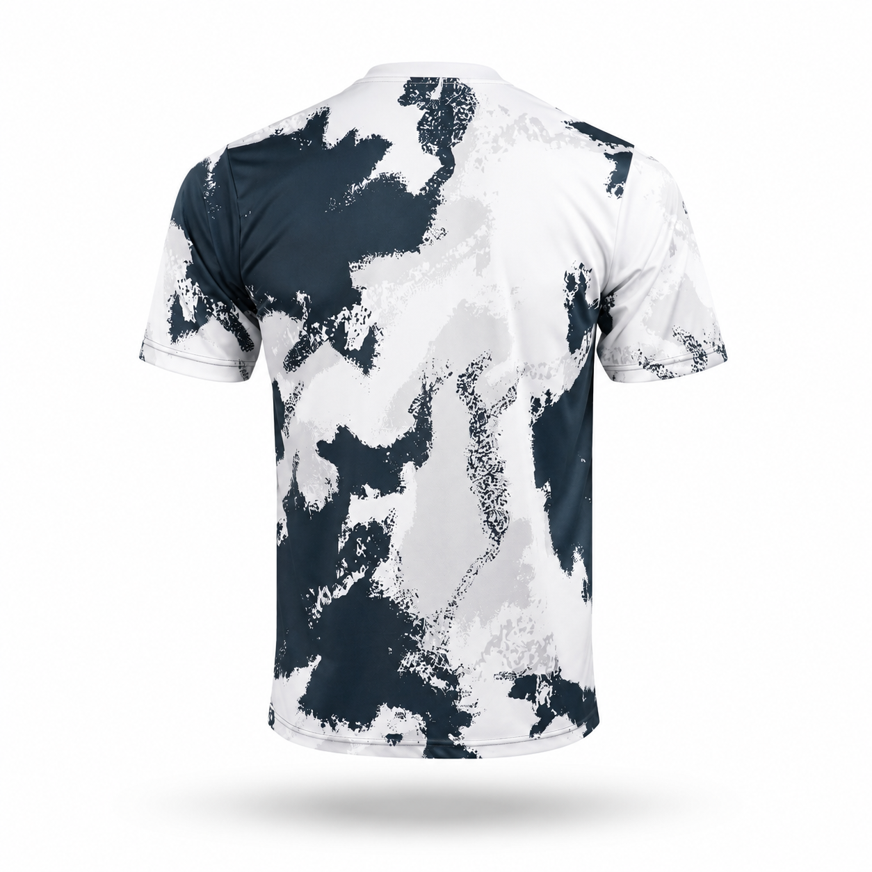 A short-sleeve athletic t-shirt with a dark navy and light gray abstract camouflage pattern, shown from the back on a white background with a soft drop shadow.