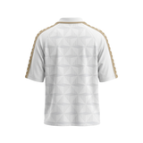 White short-sleeve athletic jersey shown from the back, featuring a subtle geometric pattern and gold braided stripes running down the shoulders and sleeves.