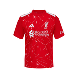 A red short-sleeve soccer jersey with white accents, featuring the Adidas logo, Liverpool F.C.