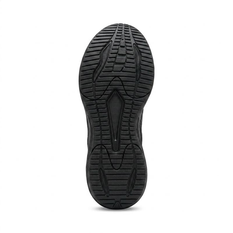 A close-up view of a black athletic shoe's textured outsole, showing deep grooves and tread patterns, set against a plain white background.