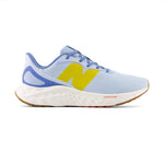 A pair of New Balance Fresh Foam Arishi women's running shoes in blue color with yellow accents.